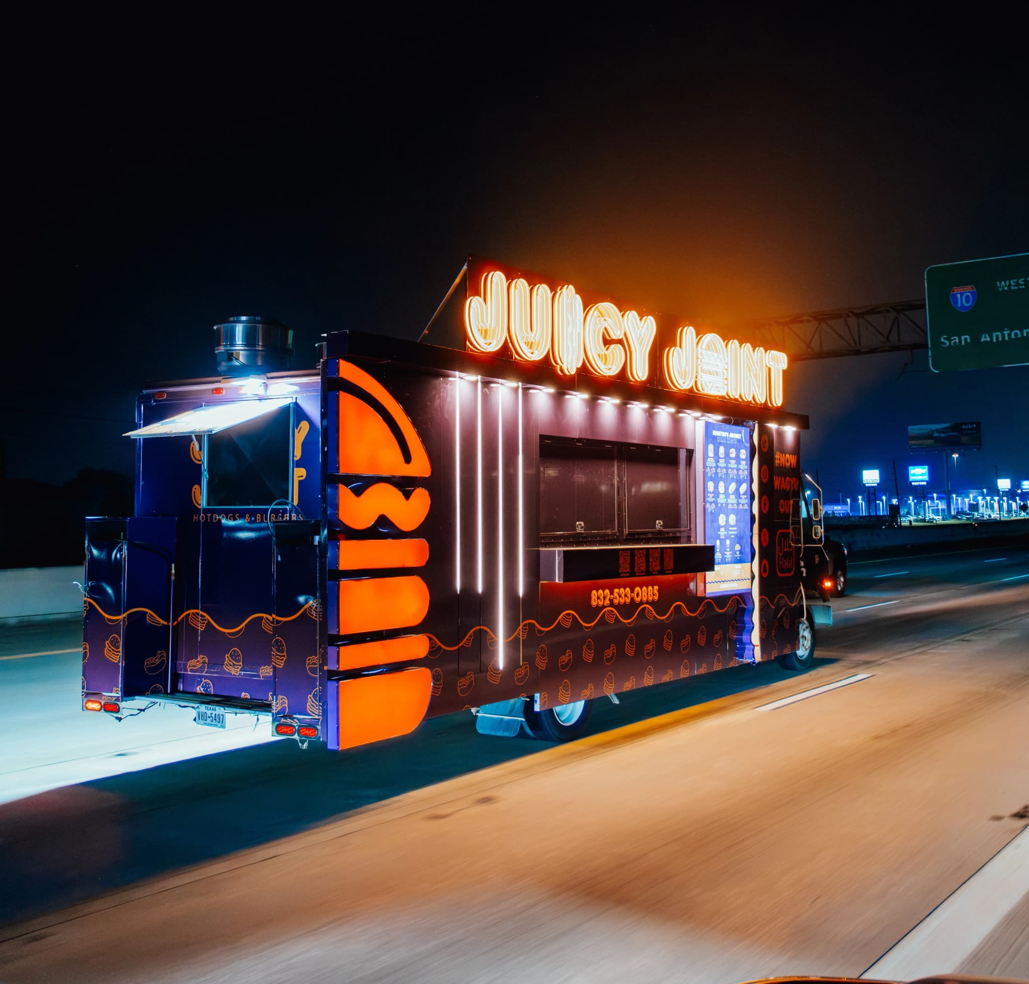 Juicy Joint food truck at night in Dallas TX